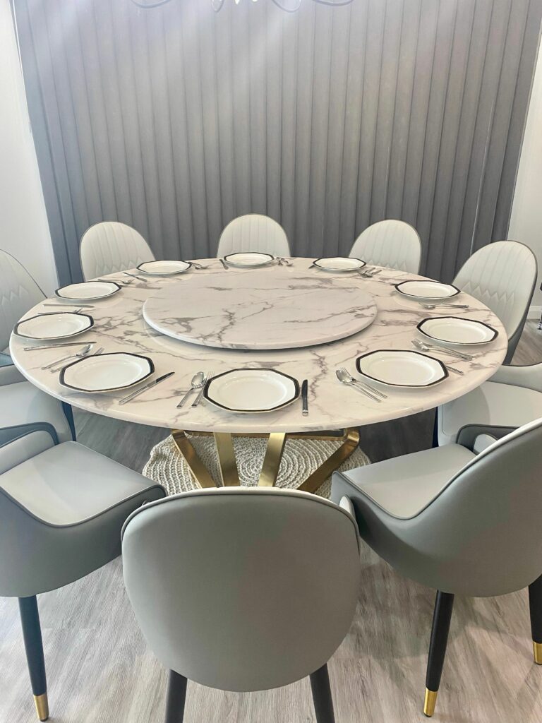 round marble dining table with chairs