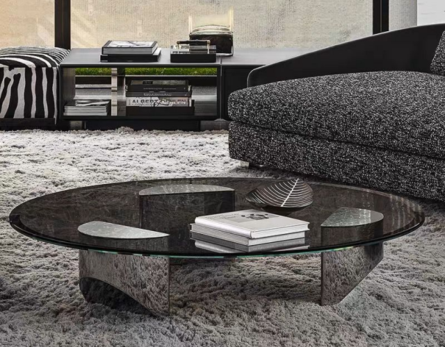 Modern coffee table with tempered glass amber color with black stainless steel legs